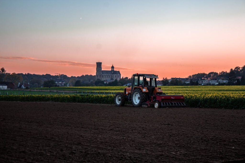 Tractor Beside Grass Field